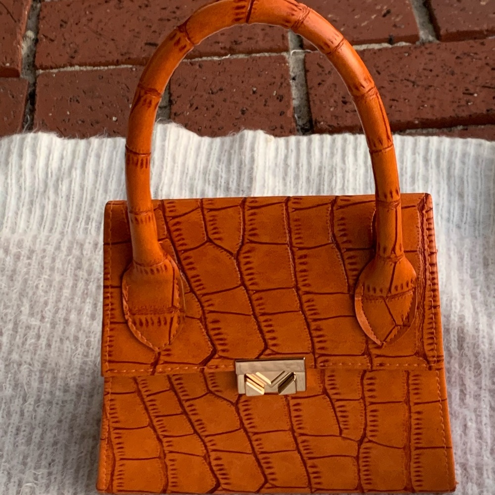 Orange crocodile print bag
